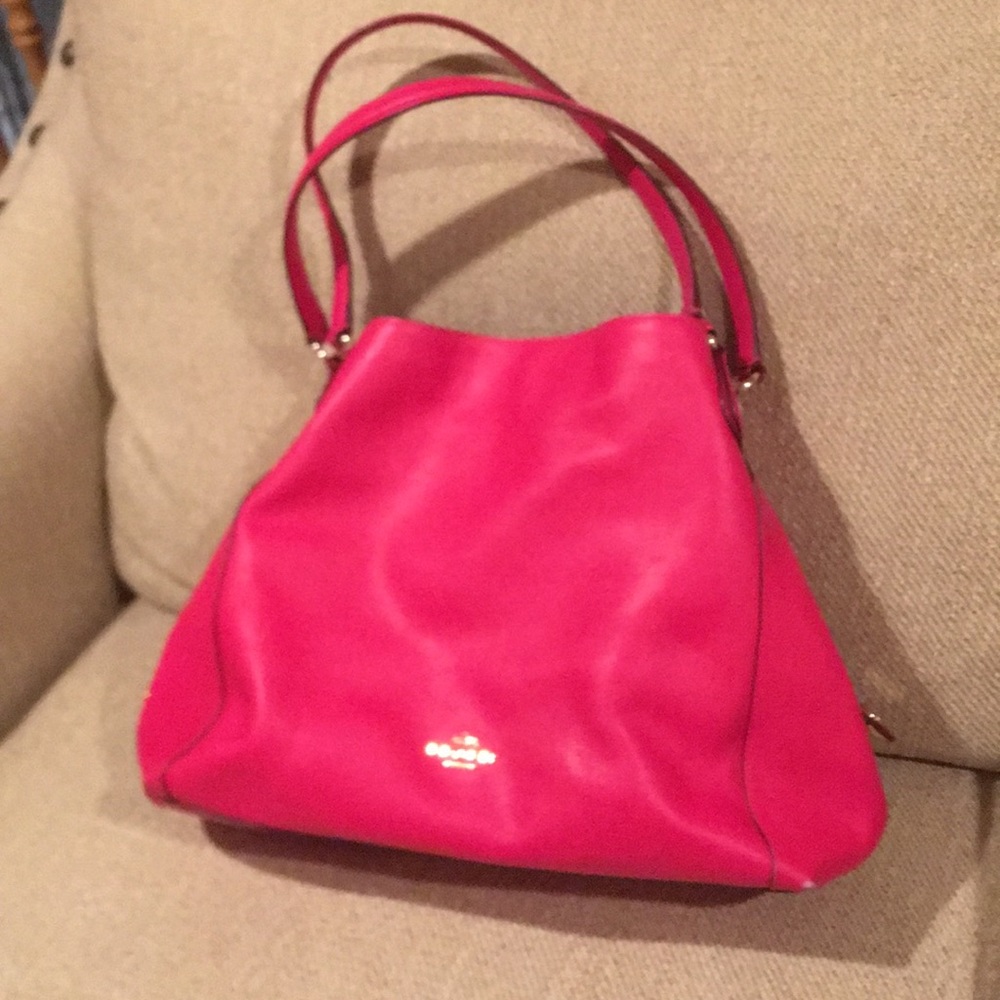 Gently used pink Coach satchel handbag